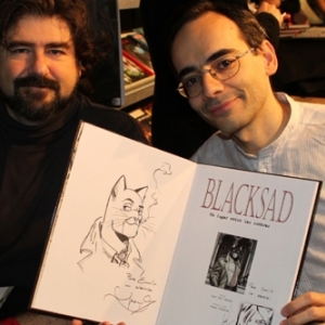 Lors d’une séance de dédicaces, Juanjo Guarnido & Juan Dias Canales © John Galati/« Studio Lapiz Azul »